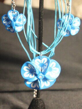 Necklace & earrings blue & white. Resin, lightweight. Good condition.